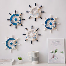 Mediterannean Style Photo Wall with Wooden Crafts Ship's Wheel